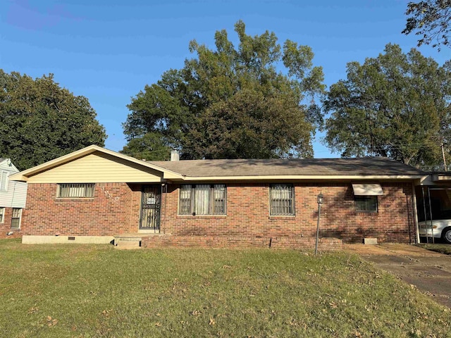 ranch-style house with a front lawn