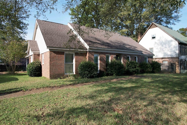 exterior space with a front yard