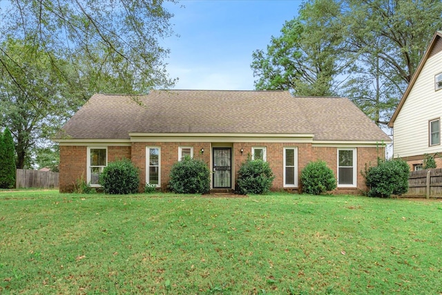 view of front of home with a front yard