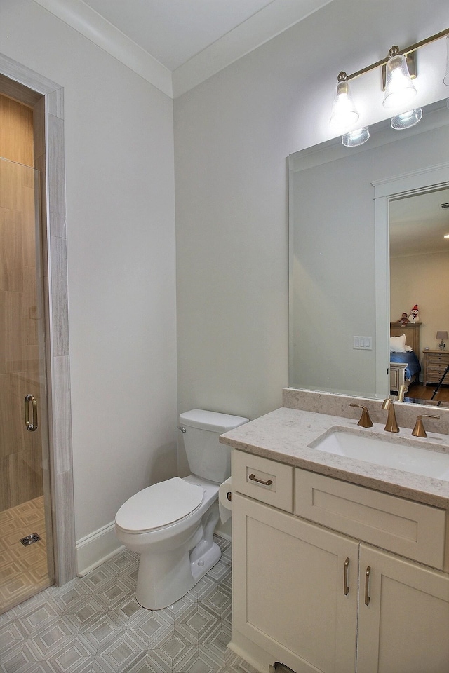 bathroom with walk in shower, tile patterned flooring, ornamental molding, vanity, and toilet