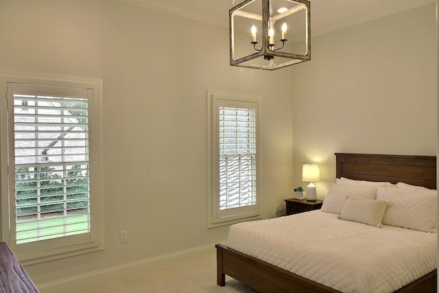 carpeted bedroom featuring multiple windows and crown molding