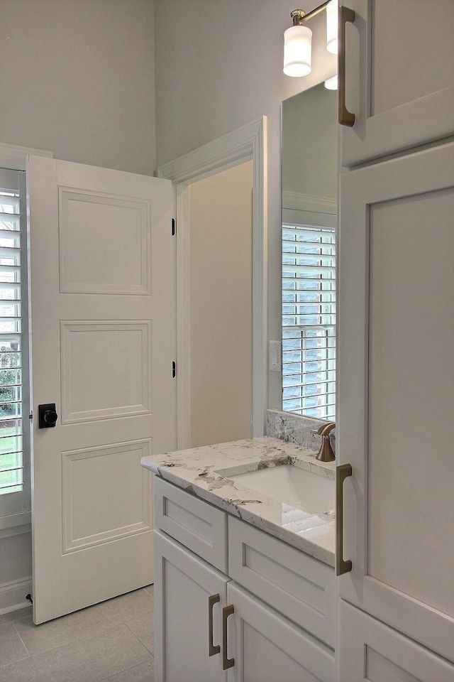 bathroom featuring vanity and tile patterned floors