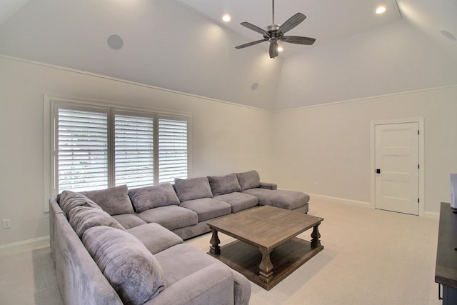 carpeted living room with high vaulted ceiling and ceiling fan