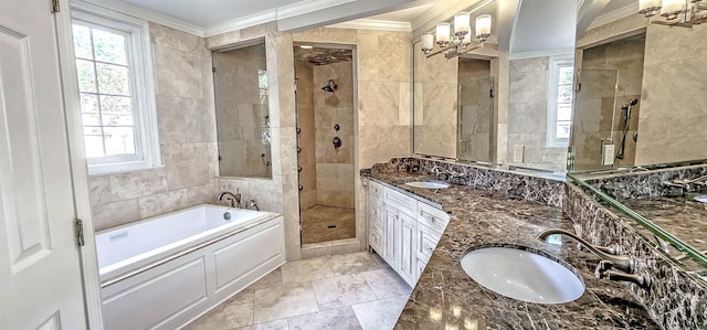 bathroom featuring vanity, shower with separate bathtub, and crown molding