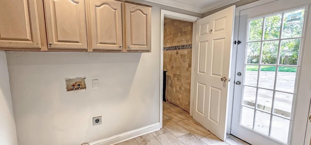 washroom featuring hookup for a washing machine, electric dryer hookup, and cabinets