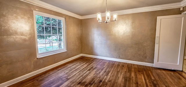 unfurnished dining area featuring an inviting chandelier, hardwood / wood-style floors, and ornamental molding