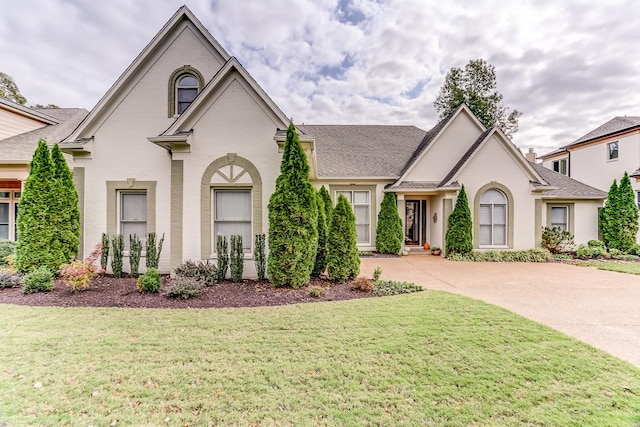 view of front of home with a front yard