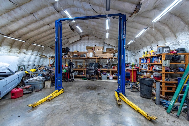 garage with a workshop area