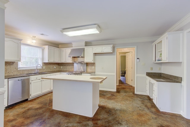 kitchen with wall chimney exhaust hood, sink, ornamental molding, white cabinetry, and appliances with stainless steel finishes