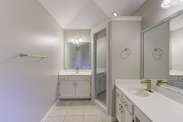 bathroom featuring vanity, tile patterned floors, an enclosed shower, and lofted ceiling