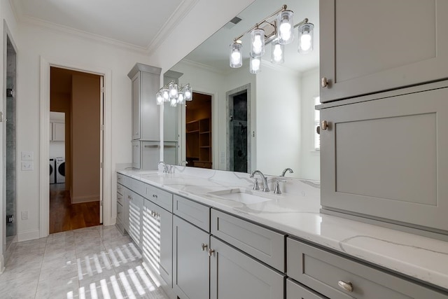 bathroom with vanity and crown molding