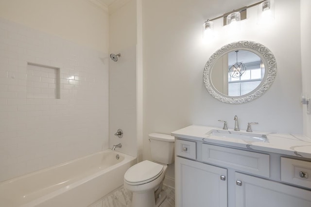 full bathroom featuring vanity, toilet, and tiled shower / bath