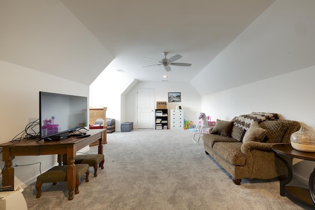 office space featuring light carpet, vaulted ceiling, and ceiling fan