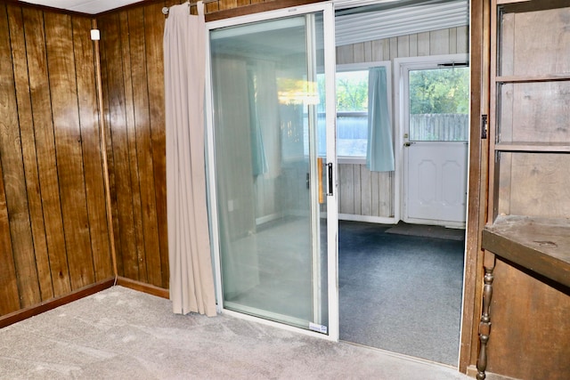 interior space featuring wood walls