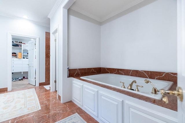 bathroom featuring a tub and crown molding