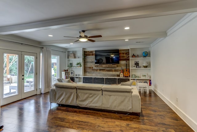 living room featuring dark hardwood / wood-style flooring, beamed ceiling, french doors, and crown molding