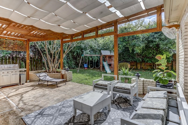 view of patio featuring a playground, a pergola, and grilling area