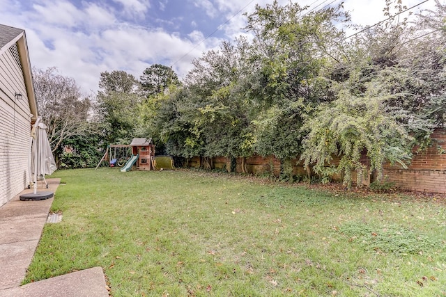 view of yard featuring a playground