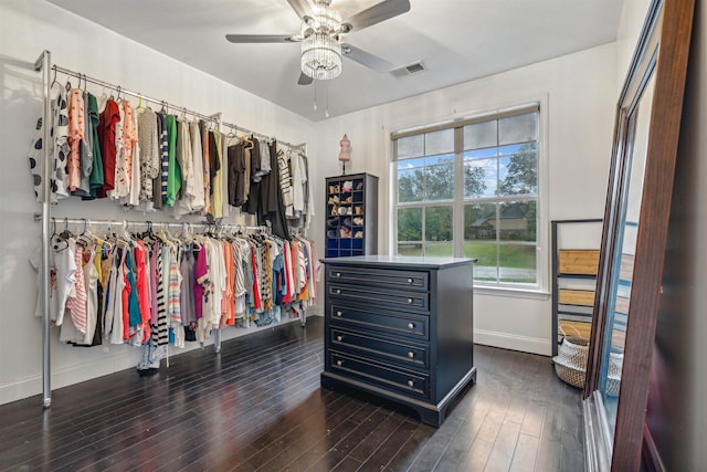 walk in closet featuring ceiling fan and dark hardwood / wood-style floors