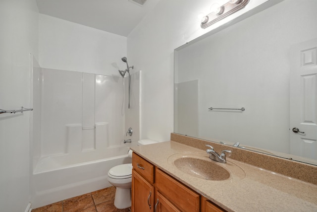 full bathroom with tile patterned flooring, shower / bath combination, vanity, and toilet