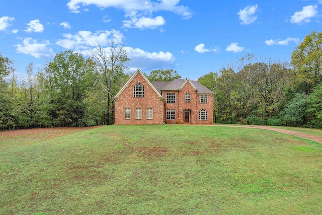 view of front of home with a front lawn