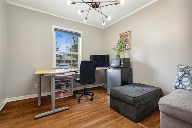 office space with hardwood / wood-style flooring, ornamental molding, and a notable chandelier