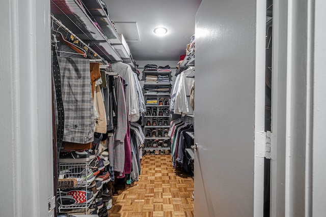 spacious closet featuring light parquet floors