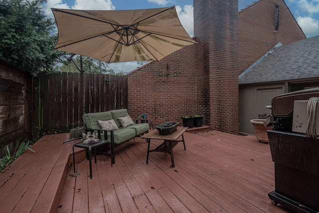 wooden deck with outdoor lounge area