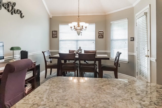 dining room with an inviting chandelier, vaulted ceiling, and ornamental molding