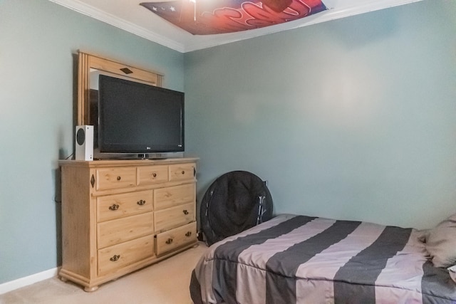 carpeted bedroom with ornamental molding