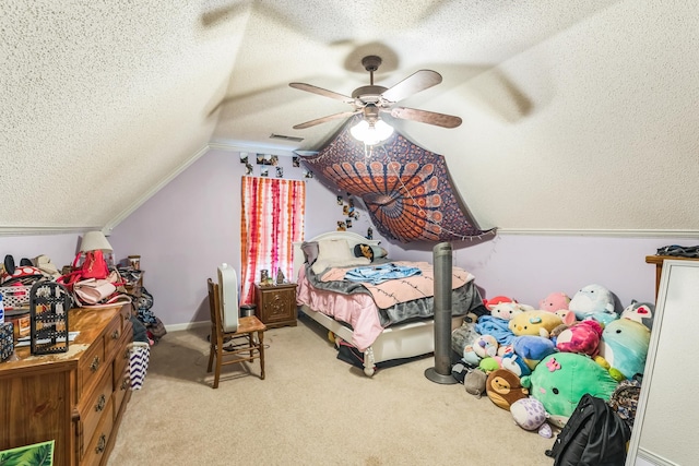 bedroom featuring a textured ceiling, light carpet, ceiling fan, and vaulted ceiling