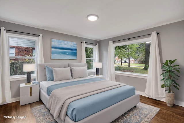 bedroom featuring dark hardwood / wood-style floors