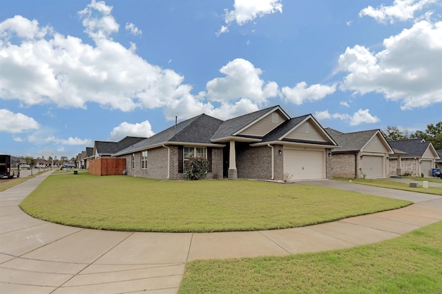 view of front of home with a garage and a front yard