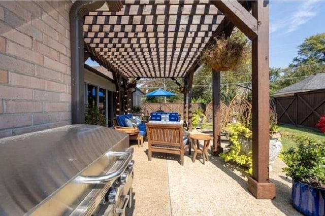 view of patio / terrace featuring a pergola and an outdoor hangout area