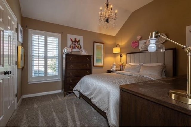 carpeted bedroom with lofted ceiling and a chandelier