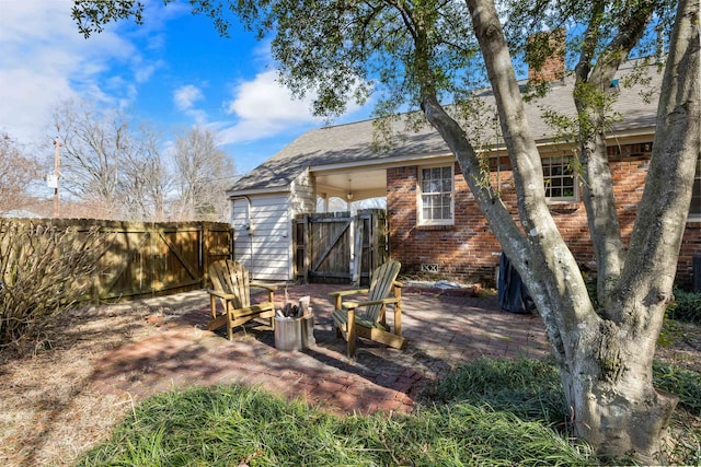 rear view of house with a patio