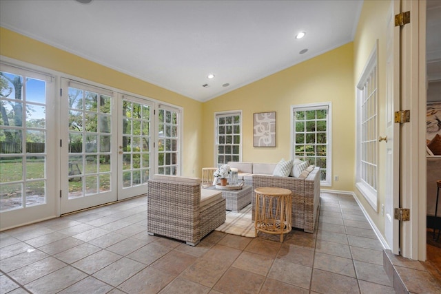 sunroom / solarium with plenty of natural light and lofted ceiling