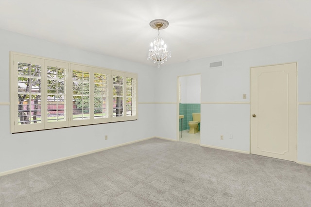 280 Waring Rd, Memphis, TN 38117 - carpeted spare room with a chandelier and baseboards