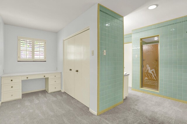 280 Waring Rd, Memphis, TN 38117 - unfurnished office with light colored carpet, built in desk, and tile walls