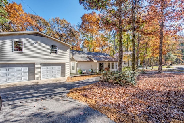 view of front of property with a garage