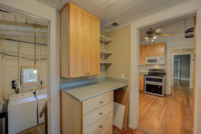 kitchen featuring light brown cabinets, stainless steel range with electric cooktop, ceiling fan, separate washer and dryer, and light hardwood / wood-style floors