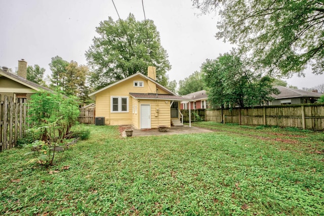 view of yard featuring central AC