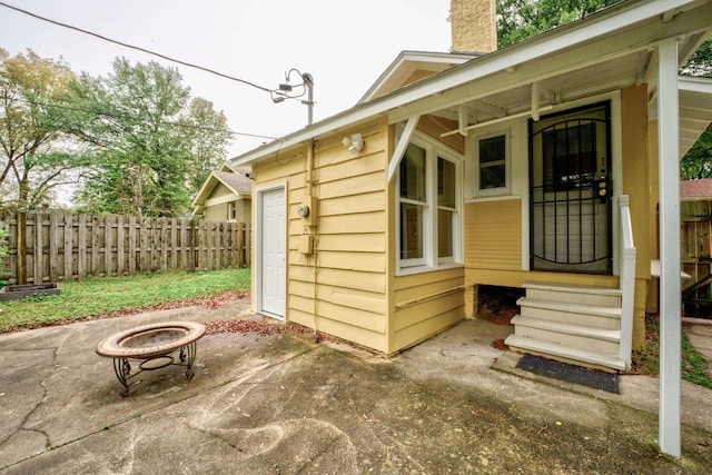 exterior space with a fire pit