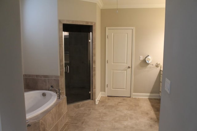 bathroom featuring ornamental molding and plus walk in shower