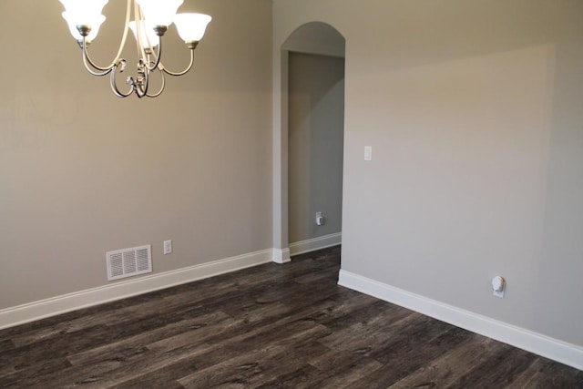 unfurnished room with dark hardwood / wood-style floors