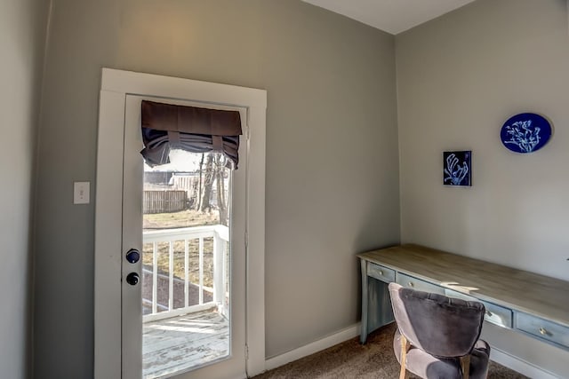 entryway with carpet floors