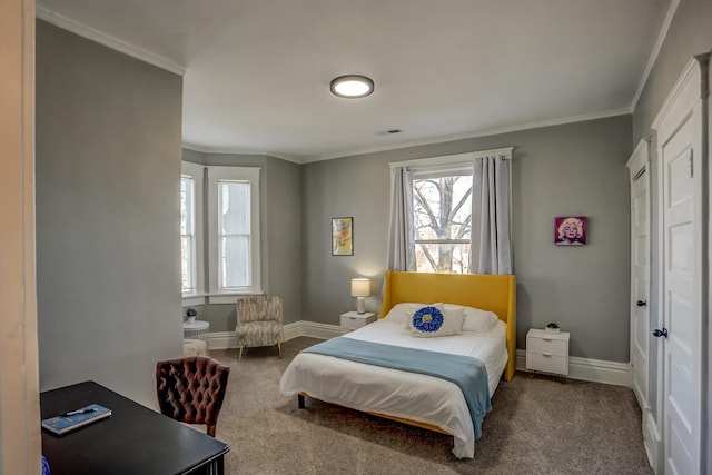 bedroom with crown molding and carpet