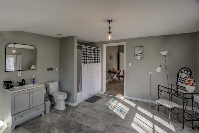 full bathroom with toilet, shower / tub combo with curtain, and vanity