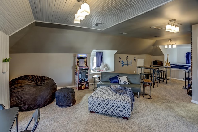 carpeted living room featuring lofted ceiling