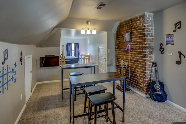 dining space with light colored carpet and lofted ceiling